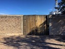 A photo of double wooden doors leading to the Donald Judd compound.