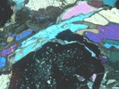 Sample MU-52 under crossed polarized light.