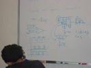 A student visualizes the expected output of a 555 timer circuit.