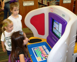 Image of children using a Tiny Tyke computer.