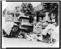 Furniture in street during race riot, probably due to eviction, Tulsa, Oklahoma, 1921.