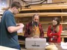 Mike Katz explains table-making to students.